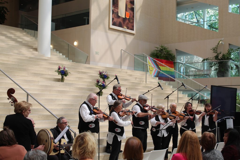 The Wild Rose Old Tyme Fiddlers performed lively music